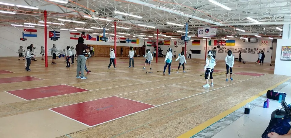 Fencers training at the Fencing Institute of Texas