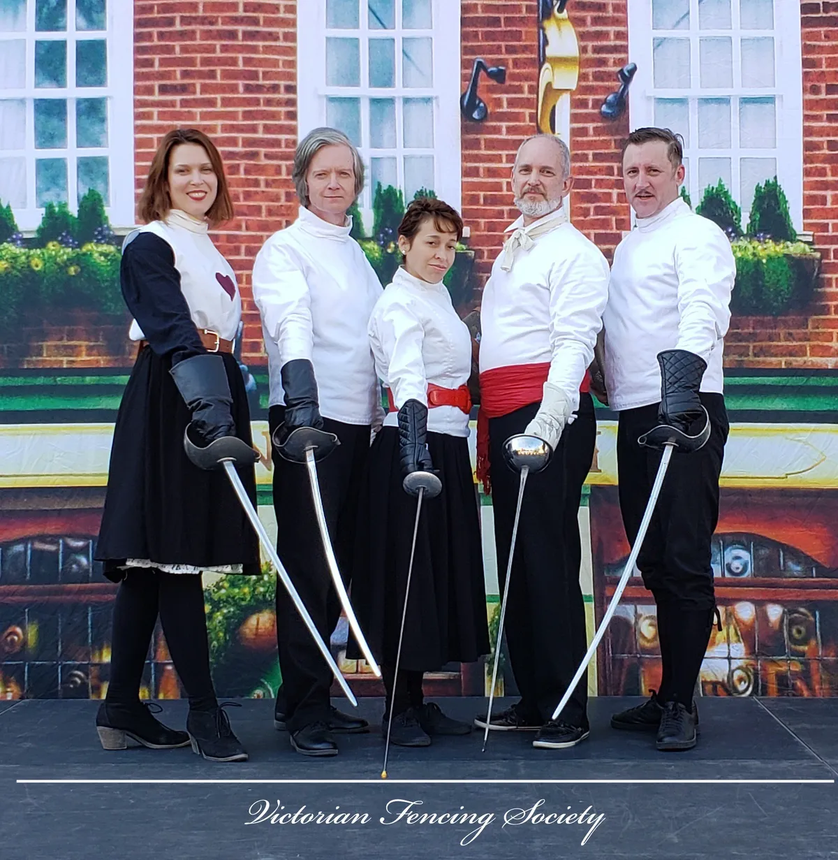 Members of the Victorian Fencing Society in historical fencing attire